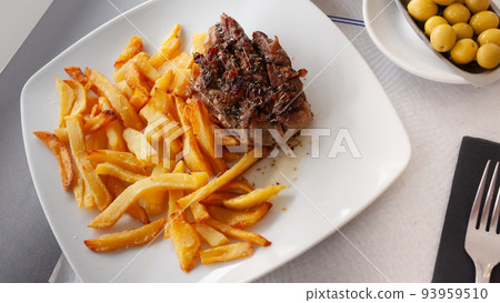 Veal flank steak in chimmichurri 93959510