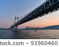 Sunset sea and bridge 93960460