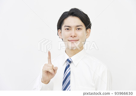 Businessman pointing with his right hand on a white background 93966630