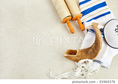 Yom kippur concept. Tallit, Thorah and Shofar jewish religious symbols Yom kippur concept. Tallit, Thorah and Shofar jewish religious symbols 93968376