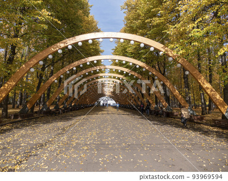 Sokolniki park, sunny autumn day wooden arch Sokolniki park, sunny autumn day wooden arch 93969594