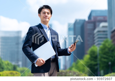 Business engineer smartphone computer office casual businessman Business engineer smartphone computer office casual businessman 93972607