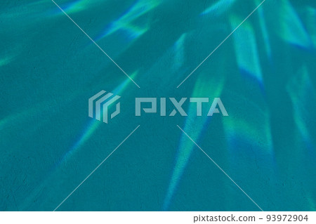 Abstract crystal light glare on turquoise blue concrete texture  93972904