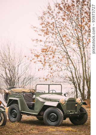 Willys Mb jeep, U.s. Army Truck, 4x4 Of Us Army Forces Of World War 2 Time Standing Parked At Forest During Reconstruction Of Some Fight World War II Willys Mb jeep, U.s. Army Truck, 4x4 Of Us Army Forces Of World War 2 Time Standing Parked At Forest During Reconstruction Of Some Fight World War II 93973727