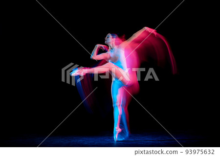 Flexible and beautiful girl, ballet dancer in motion over dark background in mixed neon light. Grace, art, flexibility, inspiration concept. 93975632