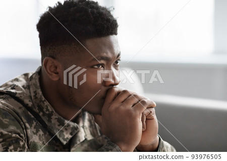Thoughtful military black man staring at copy space, side view 93976505