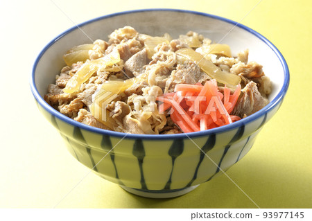 Simple hot beef bowl topped with red pickled ginger 93977145