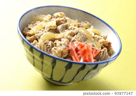 Simple hot beef bowl topped with red pickled ginger Simple hot beef bowl topped with red pickled ginger 93977147