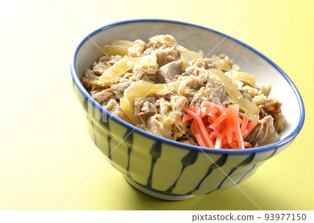 Simple hot beef bowl topped with red pickled ginger Simple hot beef bowl topped with red pickled ginger 93977150