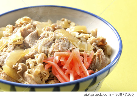 Simple hot beef bowl topped with red pickled ginger 93977160