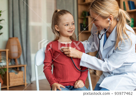Pediatrician visiting her little patient at home, woman in uniform listening to child patient breath with stethoscope Pediatrician visiting her little patient at home, woman in uniform listening to child patient breath with stethoscope 93977462