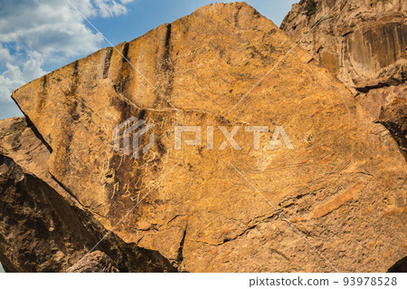 UNESCO heritage site with ancient rock inscriptions in Almaty region in Kazakhstan on the Ili River UNESCO heritage site with ancient rock inscriptions in Almaty region in Kazakhstan on the Ili River 93978528