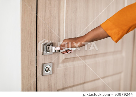 Black Lady Opening Door Reaching For Handle Entering Home Black Lady Opening Door Reaching For Handle Entering Home 93979244