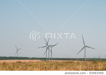 Wind turbines in an arid landscape. An alternative way of generating electricity 93983489