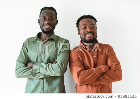 Two Smiling Black Men Posing Standing Crossing Hands, White Background 93983526