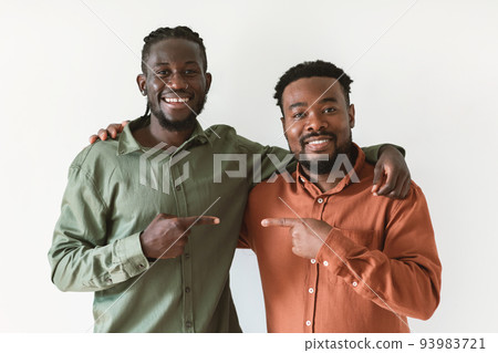 Two African Men Pointing Fingers At One Another, White Background 93983721