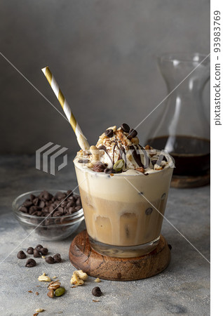 Coffee and ice crem with chocolate and coffee beans in glass, copy space 93983769