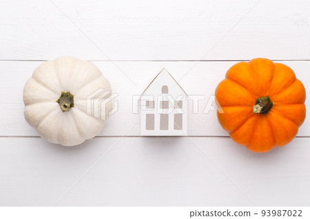Decorative pumpkins on the wooden background 93987022