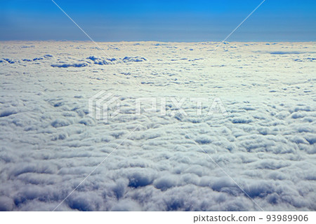 Clouds pass under wing of plane Clouds pass under wing of plane 93989906