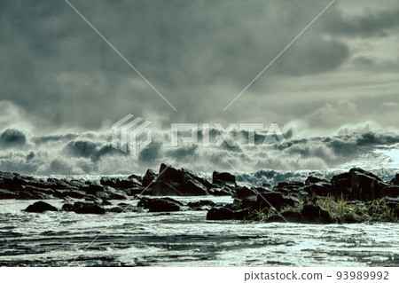 waves of Pacific ocean and rugged beauty of basalt rocks 93989992