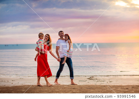 Family with kids on tropical beach. Sea vacation. 93991546