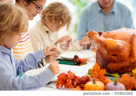 Thanksgiving family dinner. Roasted turkey meal. 93992068