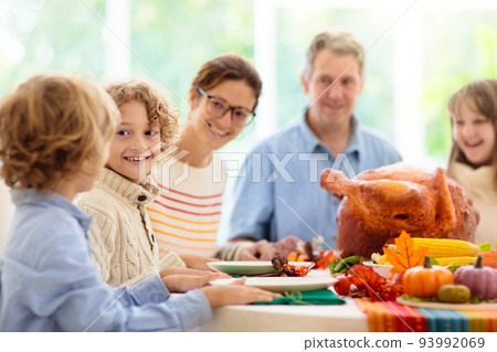 Thanksgiving family dinner. Roasted turkey meal. 93992069