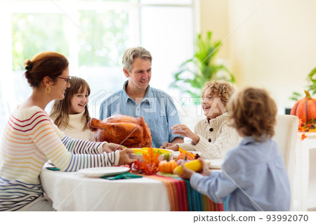 Thanksgiving family dinner. Roasted turkey meal. 93992070