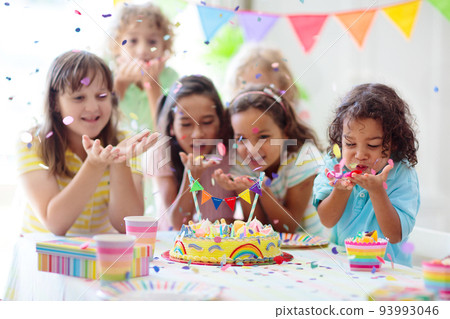 Kids birthday party. Children with cake and gifts 93993046