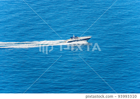 Aerial view of a Luxury Speedboat or Yacht in motion in the Blue Sea 93993310