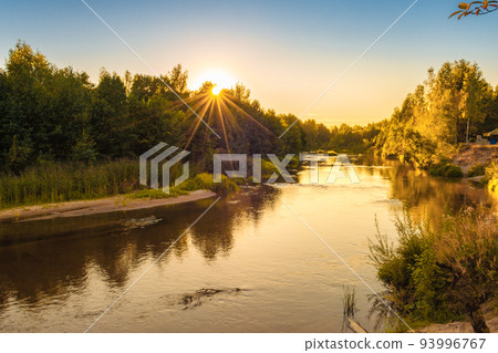 small forest river at sunset in autumn. beautiful landscape, sunset on the river small forest river at sunset in autumn. beautiful landscape, sunset on the river 93996767