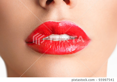 Close-up Beautiful lips. Sexy plump lips which red lipstick. Close-up Beautiful lips. Sexy plump lips which red lipstick. 93997541