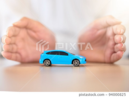.Hands, car and insurance with a business employee covering transport with her hands in her company office. Finance, saving and transportation with a broker offering to secure your vehicle at work. .Hands, car and insurance with a business employee covering transport with her hands in her company office. Finance, saving and transportation with a broker offering to secure your vehicle at work. 94000825