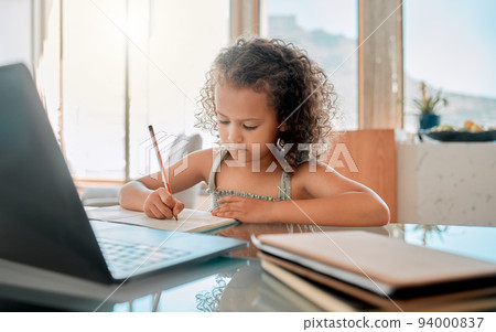 Zoom class, home school lesson and online education with little kid writing homework and test for distance learning on video call laptop. Child, young girl and student studying with virtual teaching Zoom class, home school lesson and online education with little kid writing homework and test for distance learning on video call laptop. Child, young girl and student studying with virtual teaching 94000837