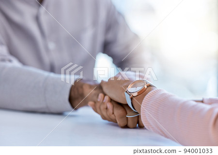 Cancer, trust and support holding hands, woman showing compassion and kindness after bad news. Female comfort male health crisis after results or diagnosis. United people show affection in hard time 94001033