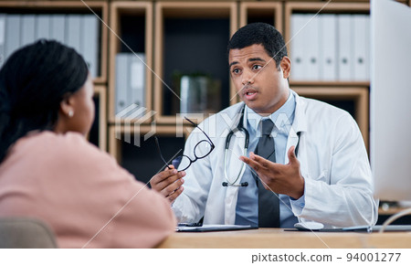 Doctor talking to patient in medical consultation, checkup and visit in clinic, hospital and healthcare center. Professional, gp and frontline worker explaining symptoms while asking woman questions 94001277
