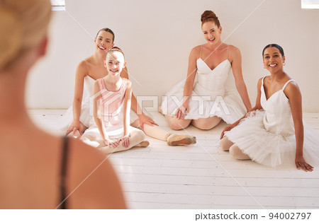 Ballet class, women and relax together on floor of studio while the training coach is speaking. Ballerina classroom and professional school for young students happy and positive about progress. 94002797