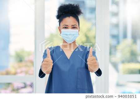 Thumbs up nurse, doctor and surgeon in covid hospital, clinic and surgery for healthcare success, trust and support. Portrait of medical worker with hand emoji for motivation, agreement and good news Thumbs up nurse, doctor and surgeon in covid hospital, clinic and surgery for healthcare success, trust and support. Portrait of medical worker with hand emoji for motivation, agreement and good news 94003851