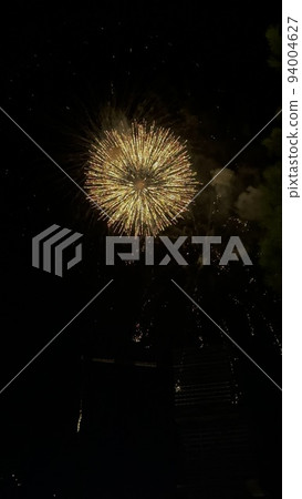 Fireworks light up the sky with dazzling display. Fireworks light up the sky with dazzling display. 94004627