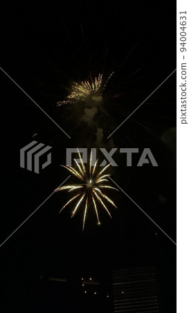 Fireworks light up the sky with dazzling display. Fireworks light up the sky with dazzling display. 94004631