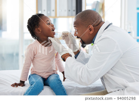 Doctor and child mouth or throat exam in healthcare hospital wellness room and medical consulting clinic. Medical expert or worker, employee and girl with trust and support for helping covid analysis 94005298