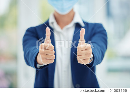 Thumbs up hands of businessman with mask for covid or covid 19 pandemic with success in health and safety. Corporate management man, manager or person in agreement and say thank you for healthcare Thumbs up hands of businessman with mask for covid or covid 19 pandemic with success in health and safety. Corporate management man, manager or person in agreement and say thank you for healthcare 94005566