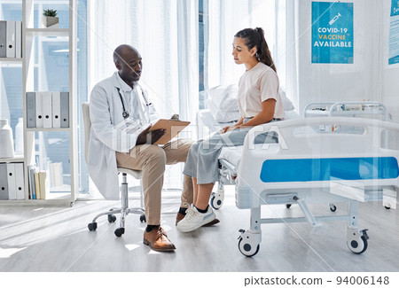Doctor, healthcare and man talking to girl patient about documents, medicine and health in a hospital. Medical worker consulting insurance and working to help woman at the clinic. Doctor, healthcare and man talking to girl patient about documents, medicine and health in a hospital. Medical worker consulting insurance and working to help woman at the clinic. 94006148