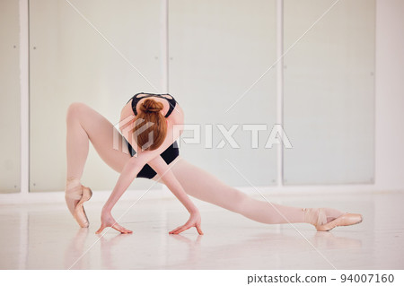 Art, ballet and creative ballerina dancing in a modern dance studio. Female classical dancer doing gymnastic training for a show. Elegant, fit and artistic athlete practicing her craft for a concert. Art, ballet and creative ballerina dancing in a modern dance studio. Female classical dancer doing gymnastic training for a show. Elegant, fit and artistic athlete practicing her craft for a concert. 94007160