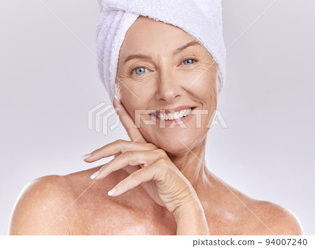 Woman with beauty, skincare and makeup or anti aging face cosmetics routine portrait. Happy and senior lady using natural spa facial product for wrinkles, health and wellness 94007240