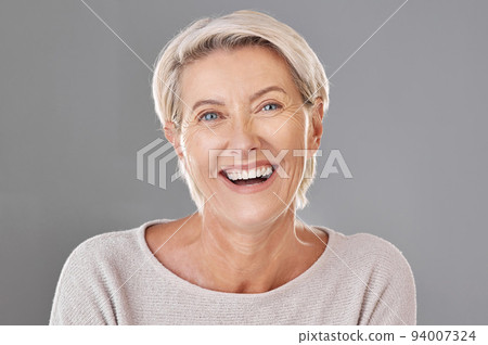 Grooming, skincare and face of happy mature woman laughing against a studio grey background. Senior female feeling fresh, enjoying free time with self care hygiene treatment. Joy after routine pamper Grooming, skincare and face of happy mature woman laughing against a studio grey background. Senior female feeling fresh, enjoying free time with self care hygiene treatment. Joy after routine pamper 94007324