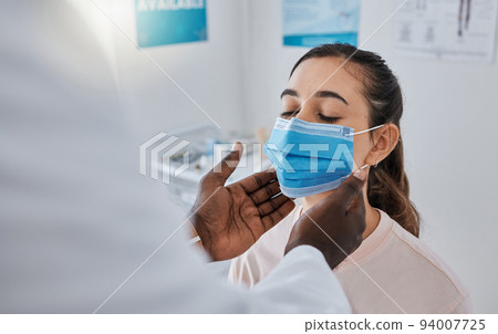 Female patient in thyroid exam from doctor, checking throat for covid virus in gp appointment or medical checkup in hospital. Woman with health insurance and face mask getting healthcare treatment Female patient in thyroid exam from doctor, checking throat for covid virus in gp appointment or medical checkup in hospital. Woman with health insurance and face mask getting healthcare treatment 94007725