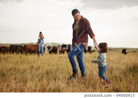 Sustainable farming family, cows on agriculture farm with rustic, countryside or nature grass background. Farmer mother, dad and kids with cattle or livestock animals for dairy, beef or meat industry Sustainable farming family, cows on agriculture farm with rustic, countryside or nature grass background. Farmer mother, dad and kids with cattle or livestock animals for dairy, beef or meat industry 94008913