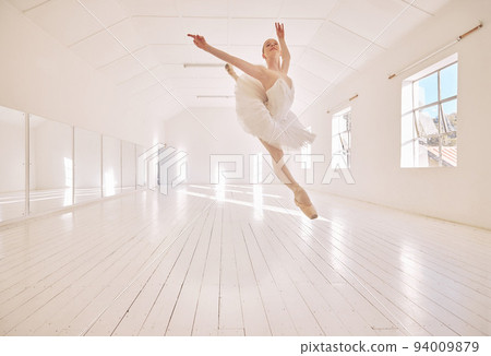 Ballet dance, jump and studio dancer dancing beautiful, elegant or classic performance in theater room. Stage artist, professional theatre ballerina and creative woman with energy moving with beauty Ballet dance, jump and studio dancer dancing beautiful, elegant or classic performance in theater room. Stage artist, professional theatre ballerina and creative woman with energy moving with beauty 94009879