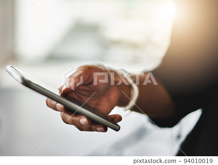Businesswoman typing on her phone online to reply to an email in the office, close up. Hand of a corporate female in leadership reading an SMS message. Lady executive checking her daily news feed Businesswoman typing on her phone online to reply to an email in the office, close up. Hand of a corporate female in leadership reading an SMS message. Lady executive checking her daily news feed 94010019